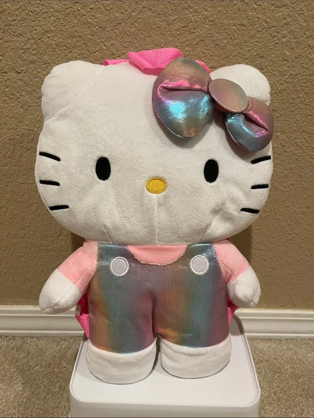 Hello Kitty Plush Backpack - White with Iridescent Rainbow Bow and Overalls